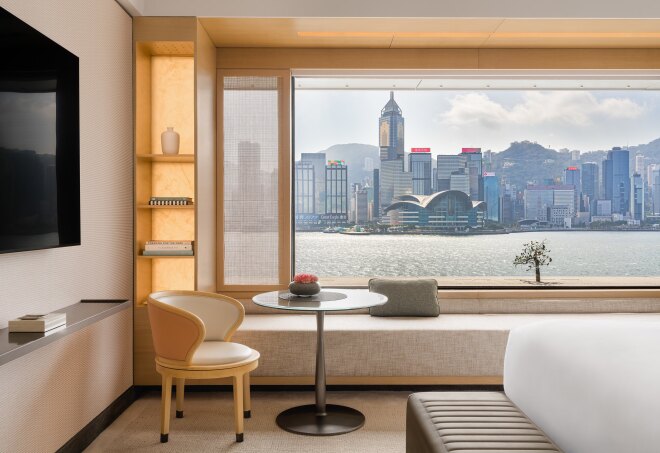 This guest room at the Regent Hong Kong features views of Victoria Harbour.